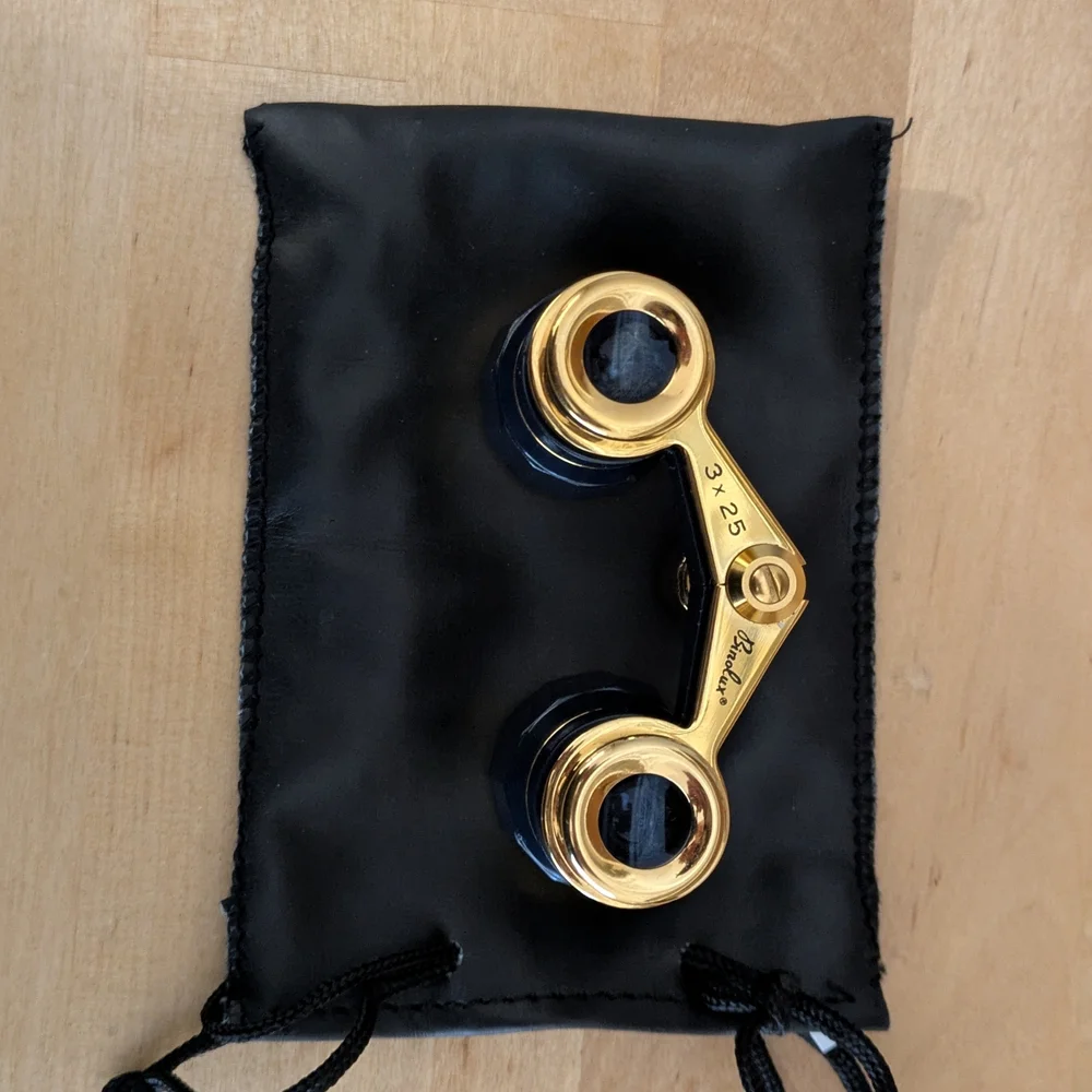 Elegant Black and Gold Binoculars